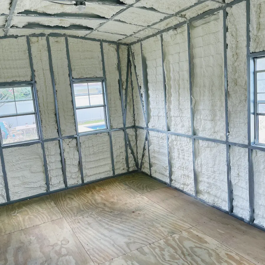 Closed-cell spray foam insulation applied to wall cavities in a residential project in Jaffrey